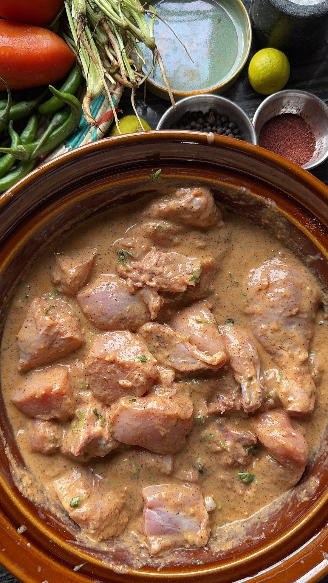 a pan of food with spices and vegetables